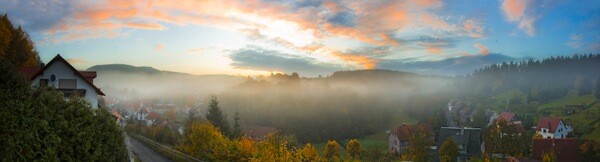 Mist covering village - Panorama
