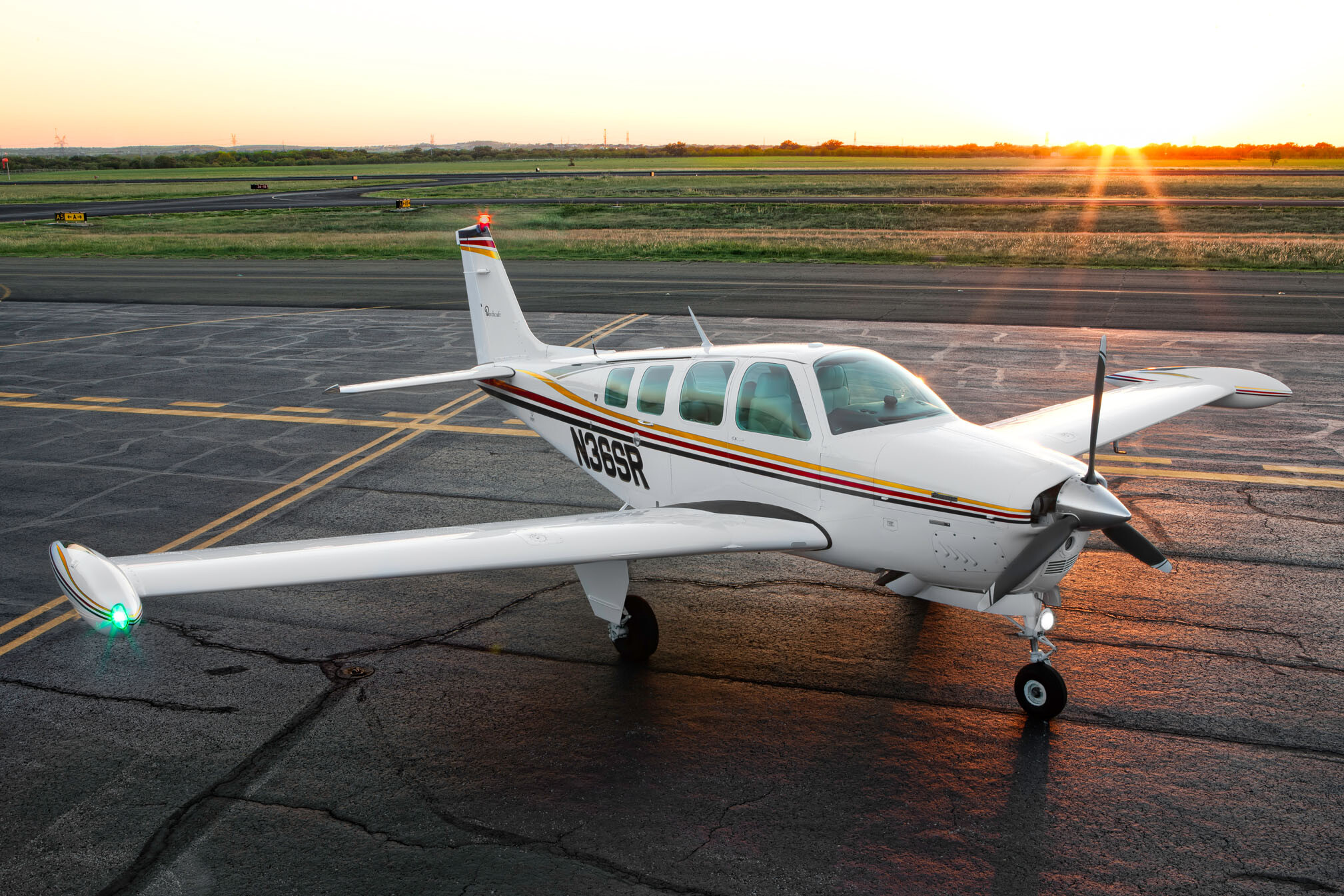 A Beechcraft Bonanza at Sunset (blown highlights from the sun included)