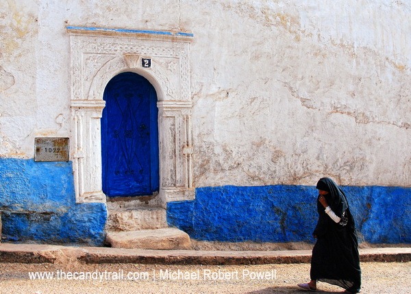 woman passing doorway