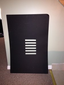 This is my homemade "windowblinds" gobo. It's probably a bit larger than it needs to be, but this helps ensure that it blocks out any unwanted stray light. You want to use flat black oak tag or mat board, as the black minimizes any reflecting light. Using a lighter colored material would reflect light that may not be wanted in the image.