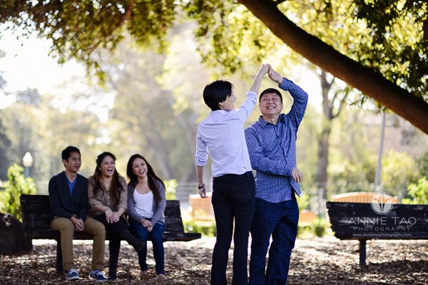 Annie Tao Photography San Francisco Bay Area lifestyle photography parents dancing while their children watch on a bench