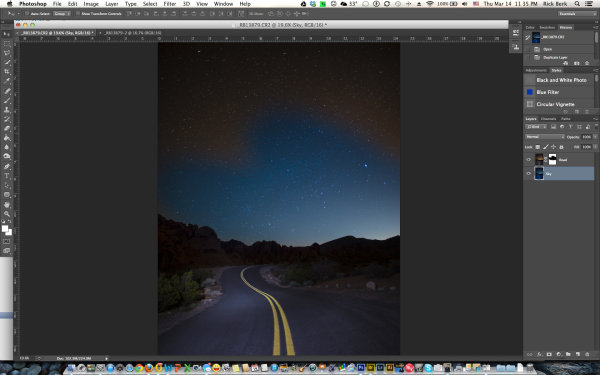 This image shows the two layers stacked, with the layer mask. The mask has only partially been painted in. After adding the layer mask to the layer, you use black or white and paint over the layer. Black hides the layer, while white reveals the layer.