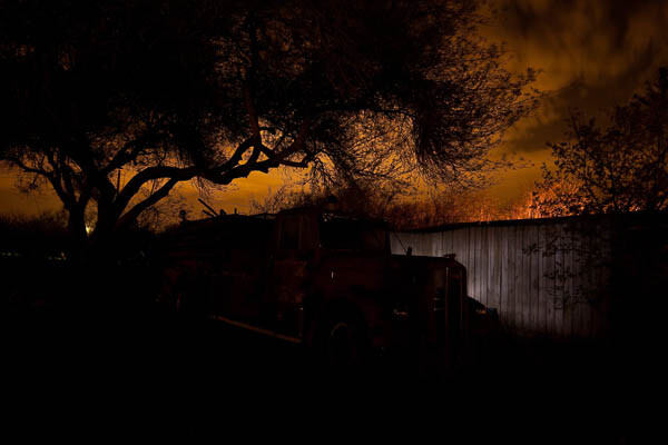 Lighting the fence behind the truck to give it separation