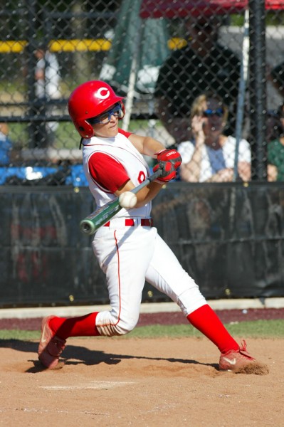 Batters are best captured from the opposite side of the plate they hit from, so right handed batters are best photographed from the first base side, and left handers from third.