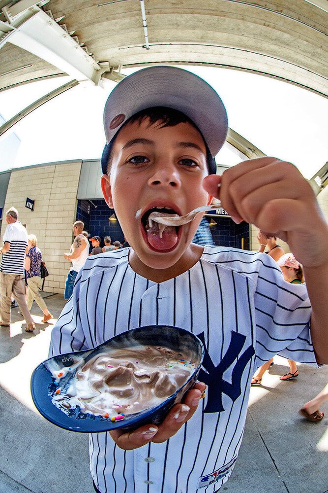 Fisheyes are great for portraits of kids. The extreme wide angle emphasizes the expressions and movements, creating a cartoon-like effect. EOS 5D Mark III with EF 8-15mm Fisheye zoom.