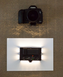 A recreation (in my office) of the setup I used. The video light is pointing straight down into the paper.