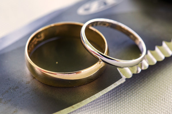 This shot was also from the military wedding. The bride and groom are knife enthusiasts as well. The groom gave me one of his knives and I played with a few arrangements before shooting this one. EOS 5D Mark III, EF 100mm f/2.8L IS. ISO 3200, f/9, 1/125.