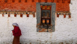 Everyday-Life-Woman-Spinning-Prayer-Wheels-at-7th-Century-Monastery-Bumthang-Bhutan-Copyright-2013-Ralph-Velasco.jpg