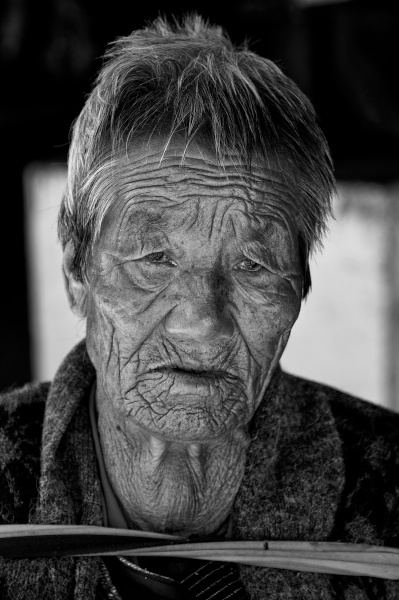 Travel Photography Tips - People -  Time in a Face  Thimpu Bhutan  Copyright 2013 Ralph Velasco