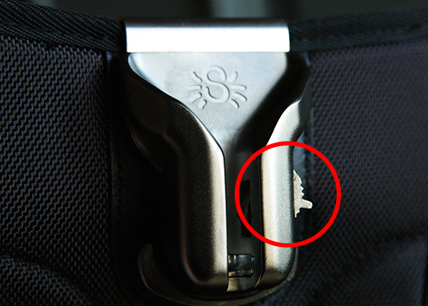 The red circle shows the locking mechanism in its locked position. Lifting it until it clicks into the "up" position disengages the lock.
