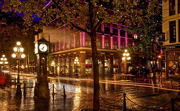 Steam Clock in Gastown, light trails on the road