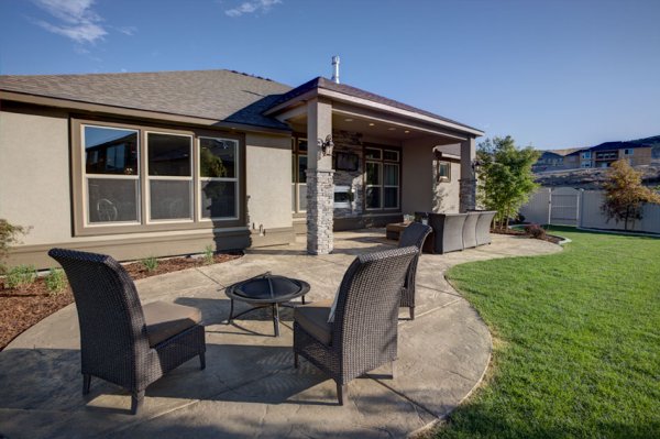   The client was most interested in the outdoor theater under cover on the back porch, which I captured, but I also captured this image showing the patio furniture and giving a broader view of the backyard.