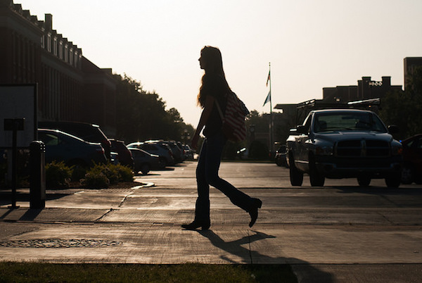 To get this shot I used the back button to focus on a different passer-by, and then waited for others to come down the sidewalk. I was then free to snap photos no matter where people were in the frame, because the shutter button was not also refocusing the picture.