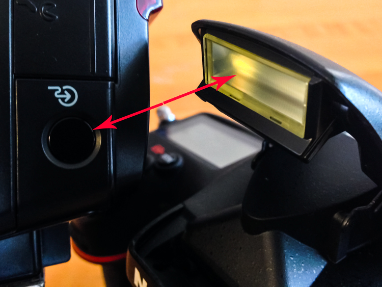 Image of pop up flash and speedlight optical receiver