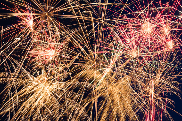 Composite image of fireworks. Several images were layered together in Photoshop changing the blending mode of the layers to lighten allows the images to blend into what appears to be one image.