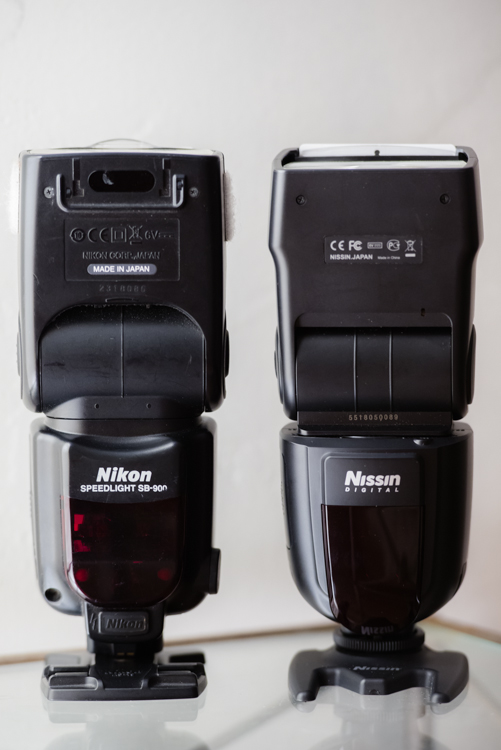 Side by side comparison of the Nissin Di700A and the Nikon SB-900