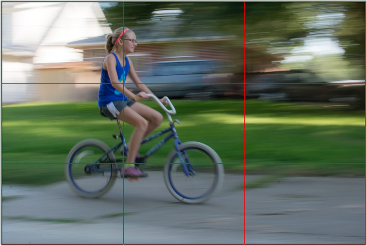 motion-and-composition-bike-left-panning-grid