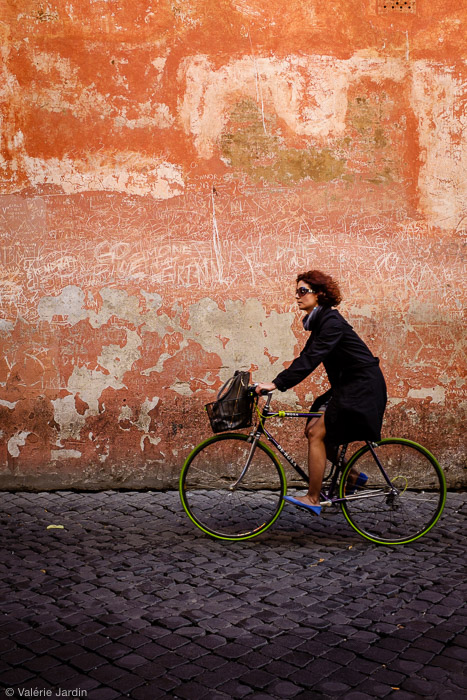 Color or Black and White for Street Photography? 6 Finding a textured colorful background and waiting for the right subject to enter your frame makes for a strong color street photograph. The green tires and blue shoes completed the shot.