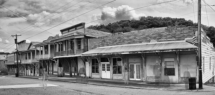 This ghost image was created in Photoshop by combining an image of an old ghost town and scanning some old family photos to use as ghost images.