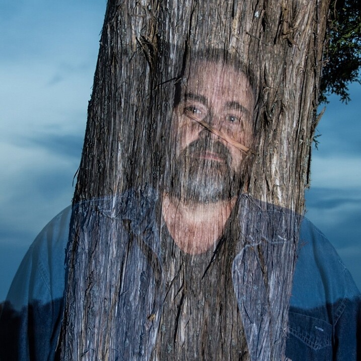 To create this multiple exposure image, two exposures were captured on one frame. The first exposure captured the ghost and the tree and the second exposure was of the tree only. Notice the dark areas do not reflect light, allowing the tree to show through the ghost.