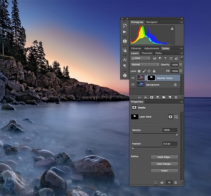 I created a duplicate layer to warm up the sunrise a bit and look more like it appeared when I was there. But since I still wanted the cooler tones on the rocks, water, and the rest of the sky, I used a layer mask to show only the warmer tones where I wanted them.
