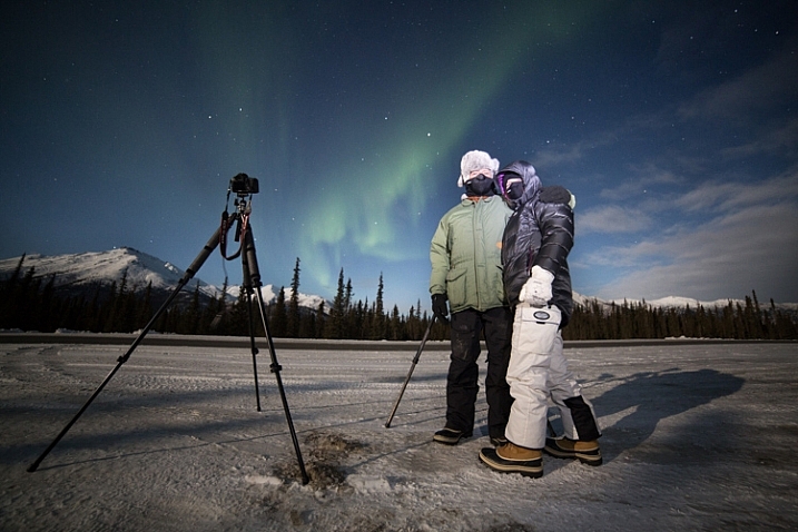 Two of my clients on an aurora photography tour, dressed for the weather.