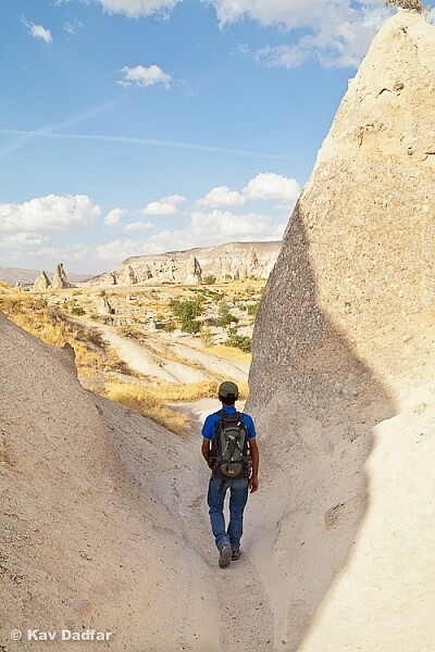 I took this photo as a walker passed me through this narrow walkway. I then waited and waited to see if I could capture another shot with other people, but no one else walked past. Never miss the shot, you may not get another chance.