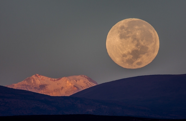 Some images require certain equipment. Without a big telephoto, this shot of the full moon over the Andes would have been impossible.