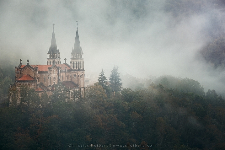 Foggy sunrise at Covadonga cathedral in Asturias, Spain