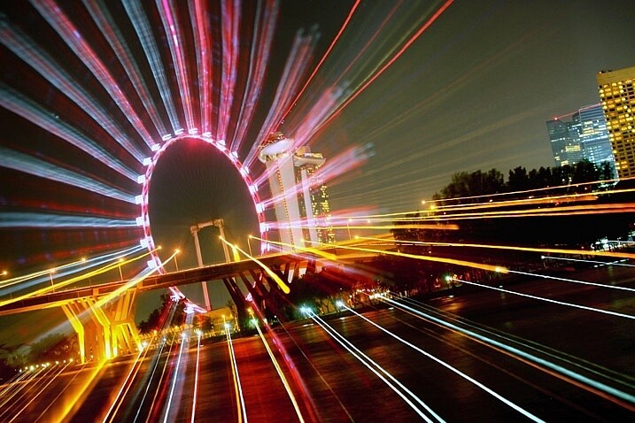 The ferris wheel is a great subject for zoom bursts. The middle is empty, and there is a ring of light to zoom out.