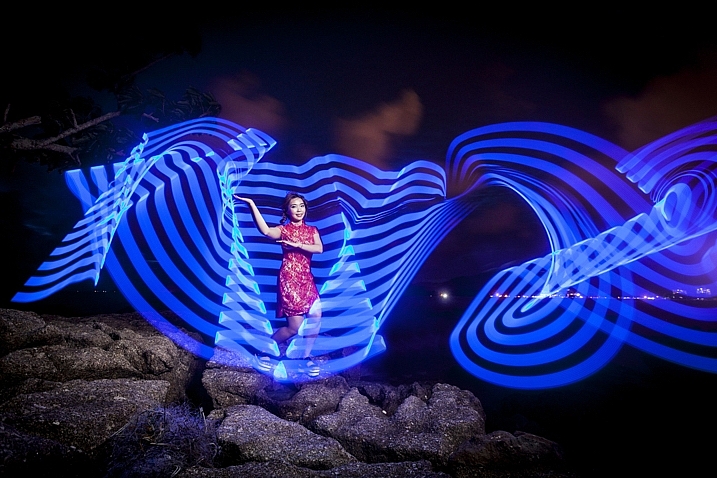In this photo a Jinbei 600 flash was used to light the model, while the pixelstick produced the light painting.